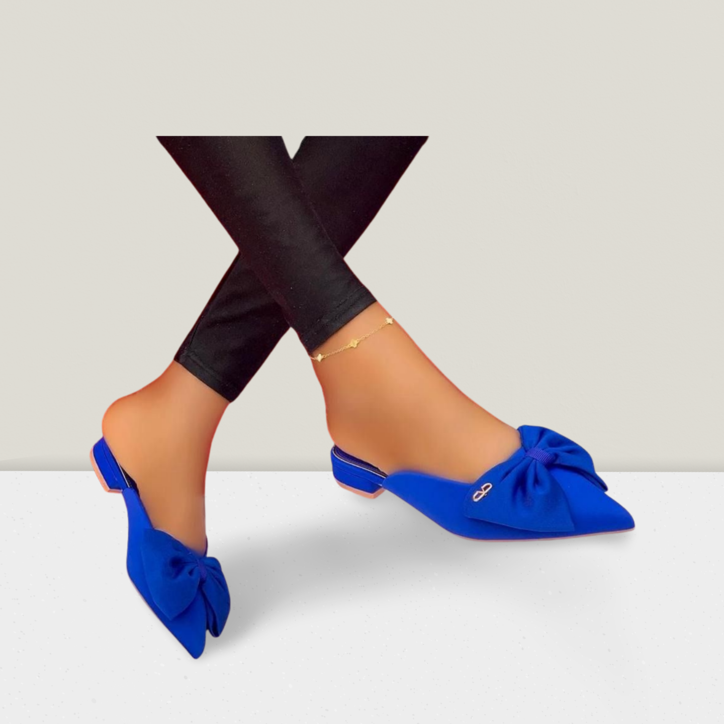 Bow-Detail Pointed Flat Mules